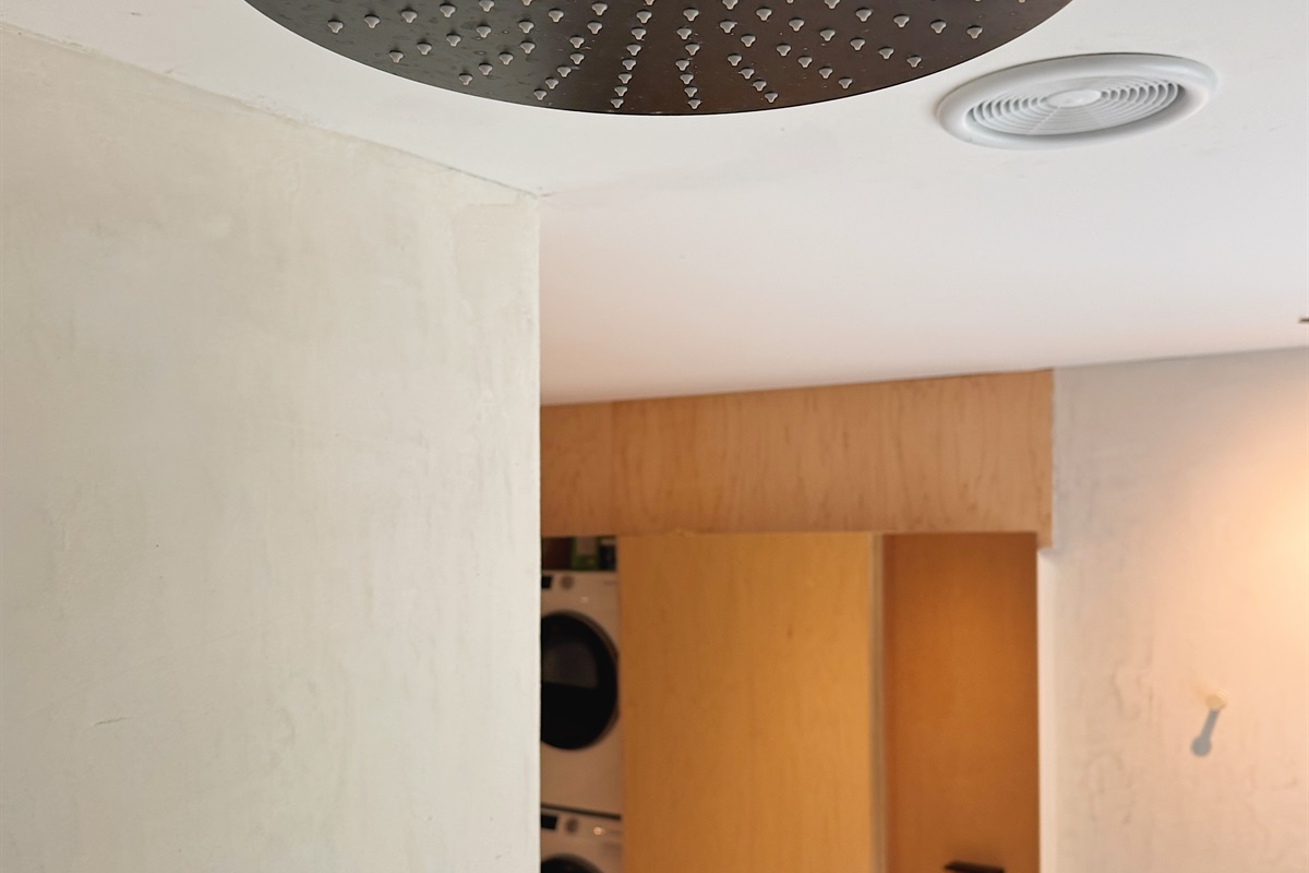 A 12" rain shower head in the full bathroom upstairs.