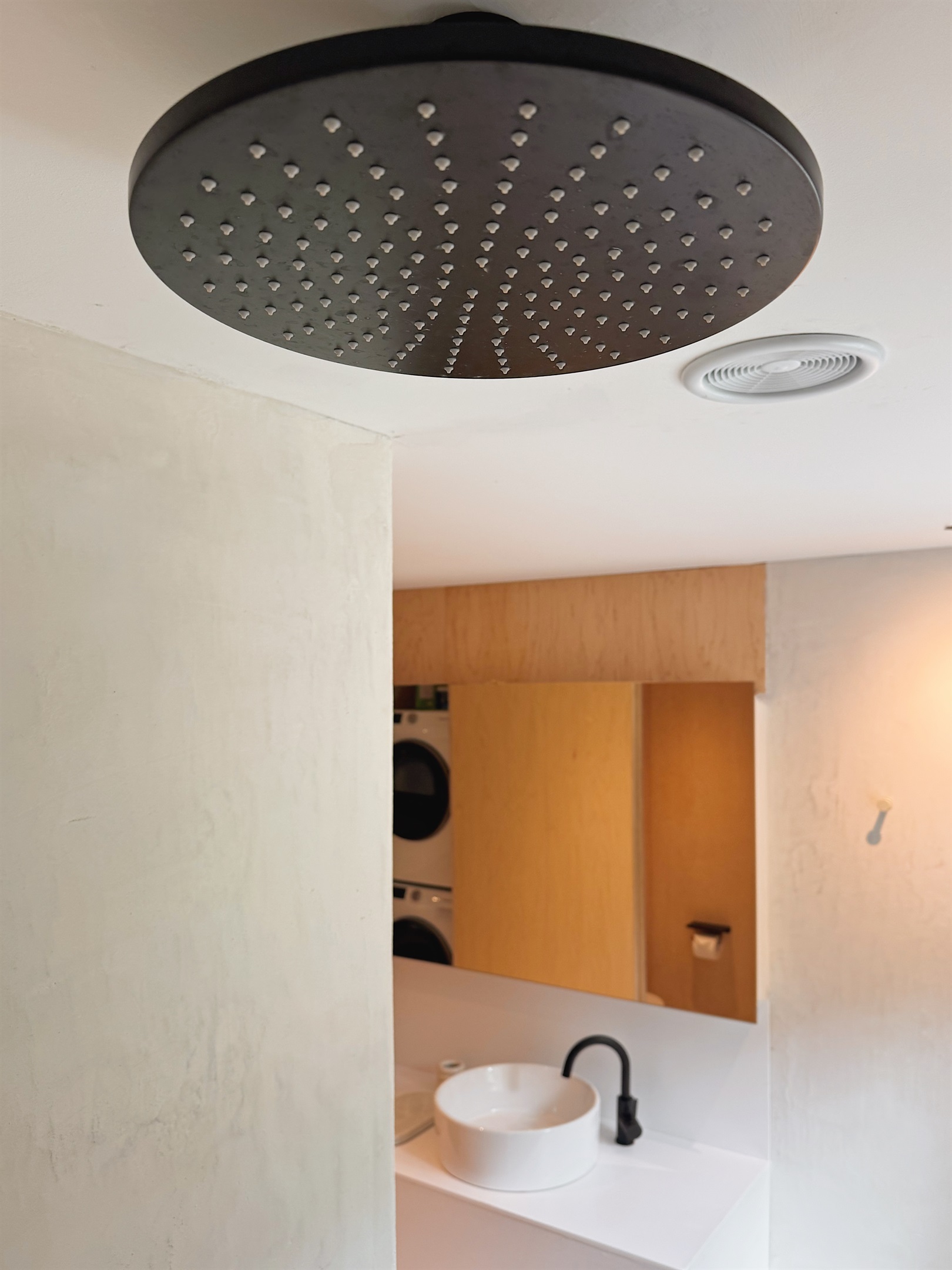 A 12" rain shower head in the full bathroom upstairs.