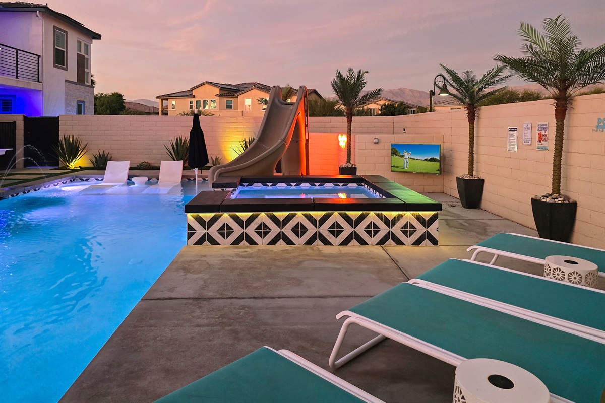 Outdoor TV next to the spa. Never miss your favorite sports game or show.