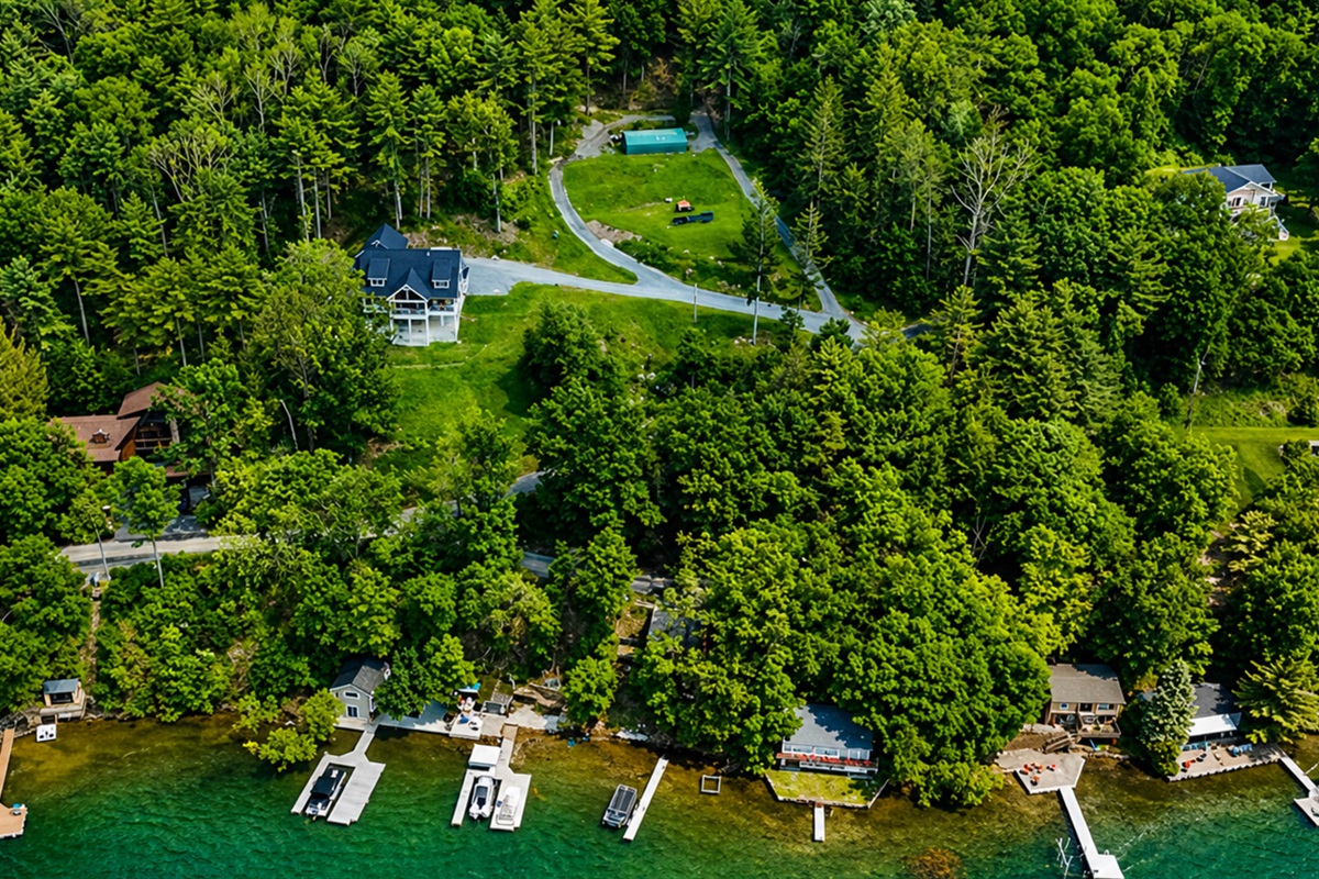 Secluded lakefront retreat with wooded views and private dock—nature and relaxation in one spot! 🌲🏡🌊