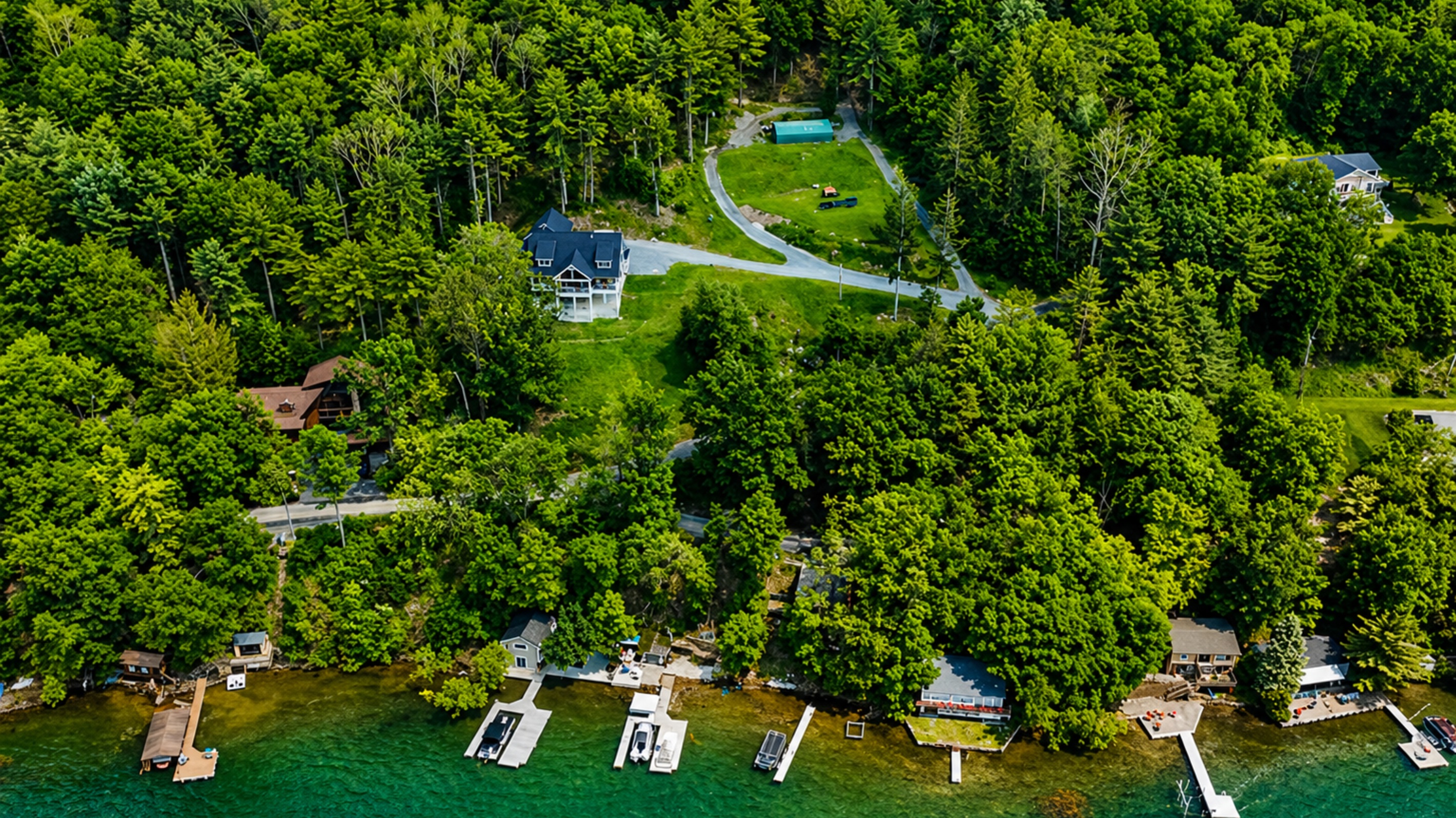 Secluded lakefront retreat with wooded views and private dock—nature and relaxation in one spot! 🌲🏡🌊