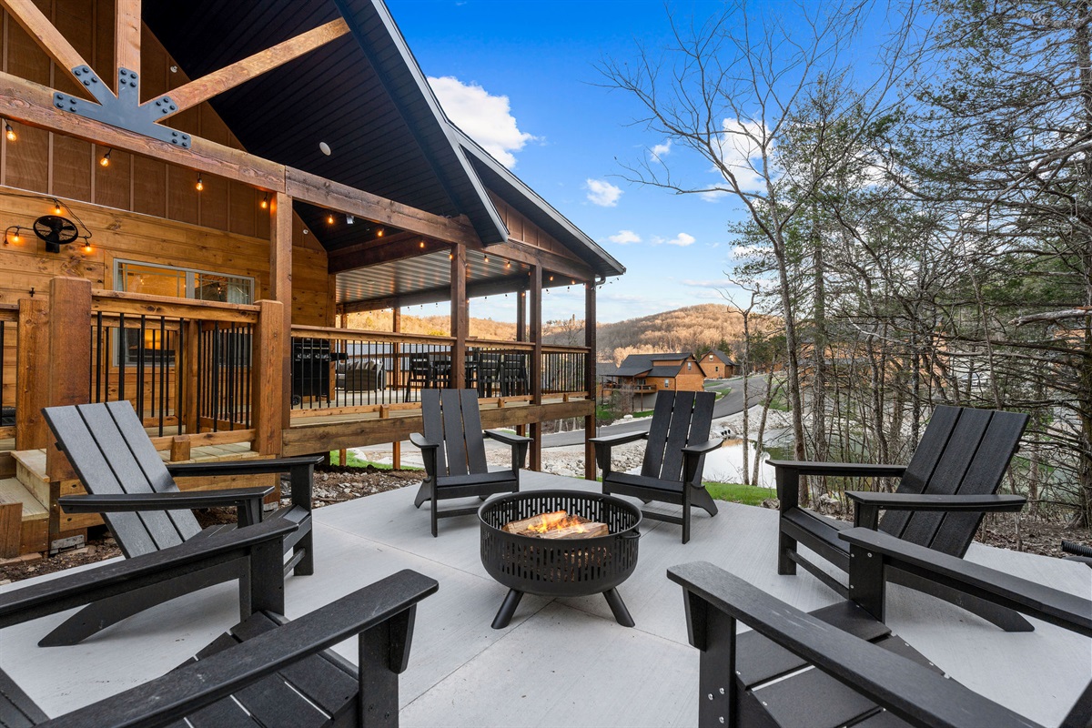 Fire pit seating with a view back toward the cabin.