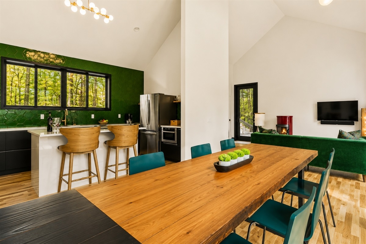 Step into a space designed for both functionality and style, where culinary creativity meets elegant dining. The open-concept kitchen is a chef’s dream, featuring sleek countertops, state-of-the-art appliances, and ample cabinetry for all your kitche