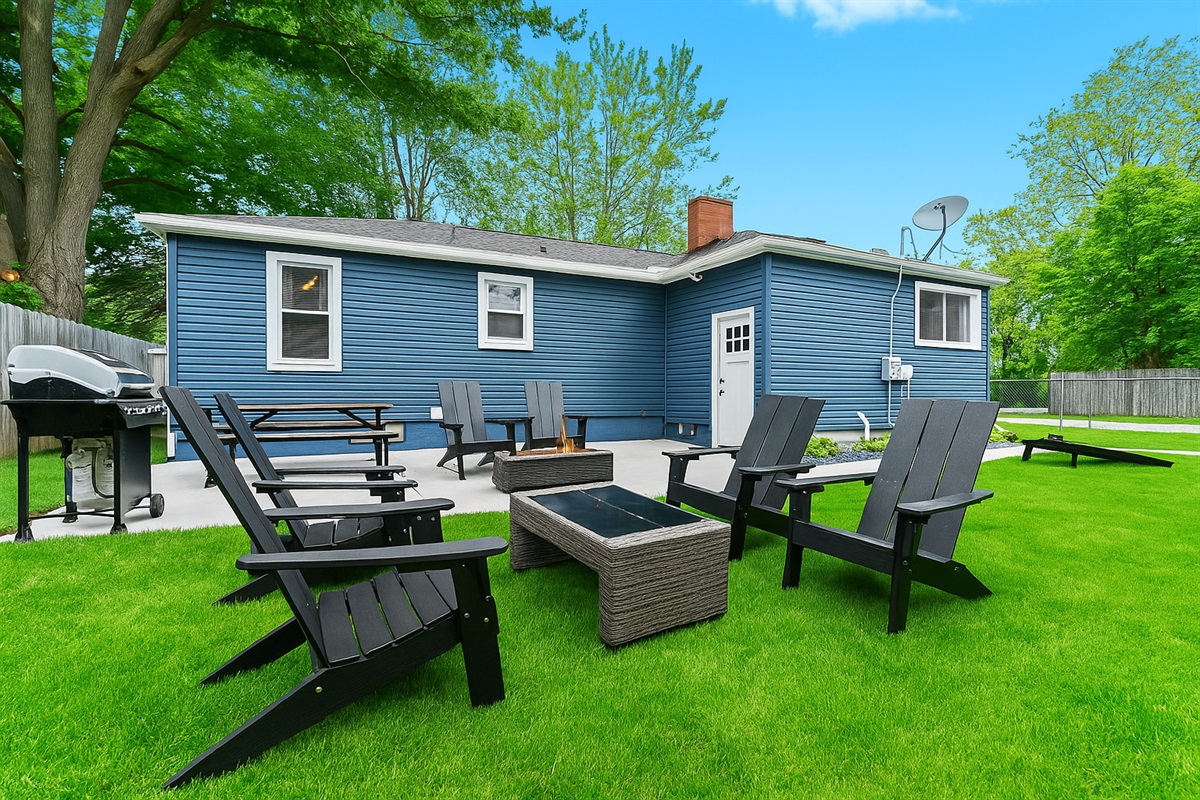 Gather around the gas fire table or fire up the BBQ—this fenced backyard is perfect for relaxing, grilling, and making memories.