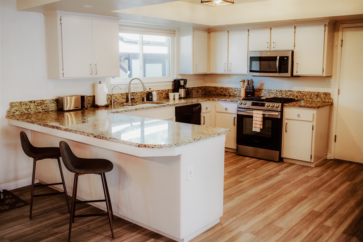 Bright, fully equipped kitchen with modern finishes.