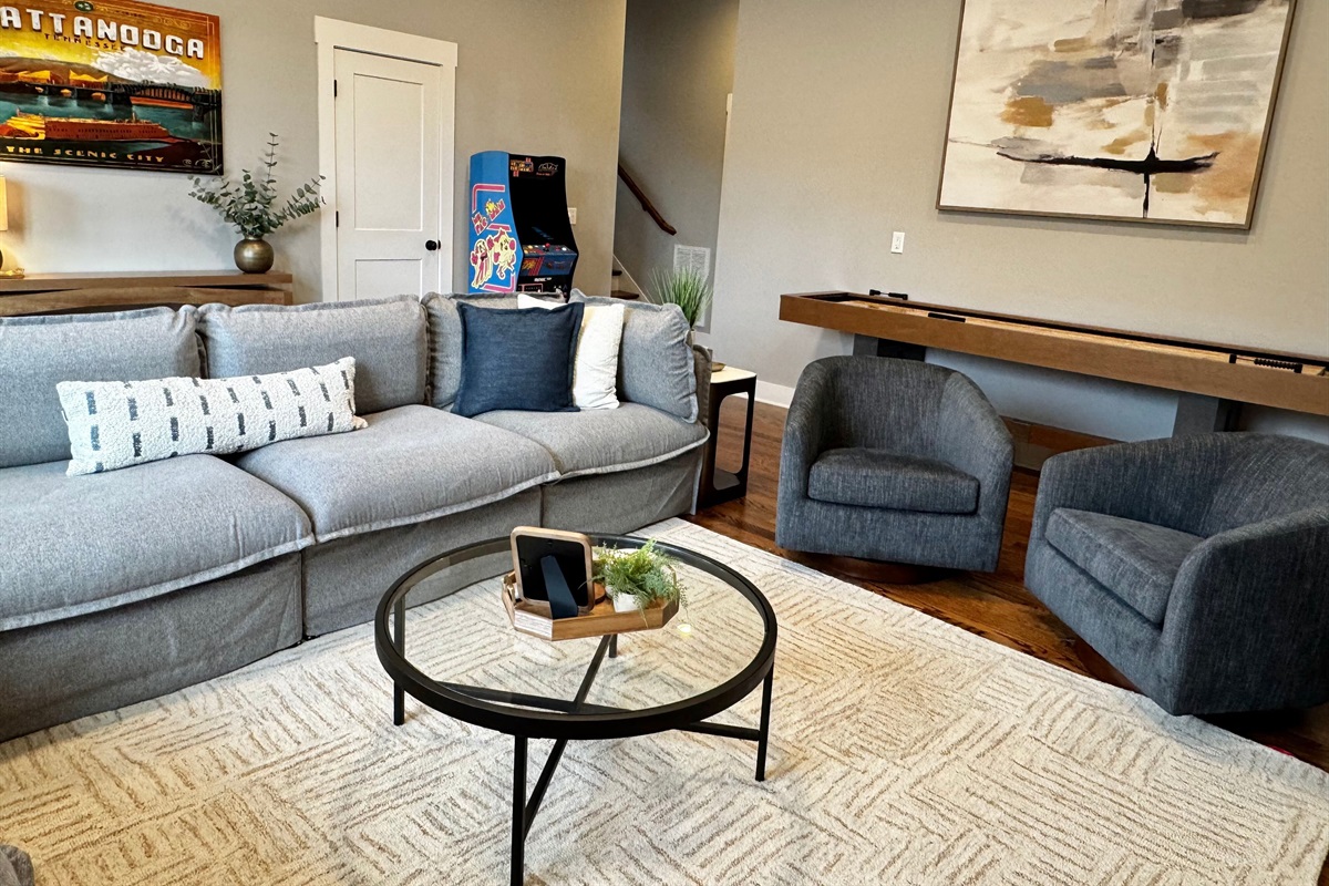 The vintage arcade and shuffleboard table add extra options for competitive fun! We also have a jumbo Jenga game and giant Connect Four in the closet!