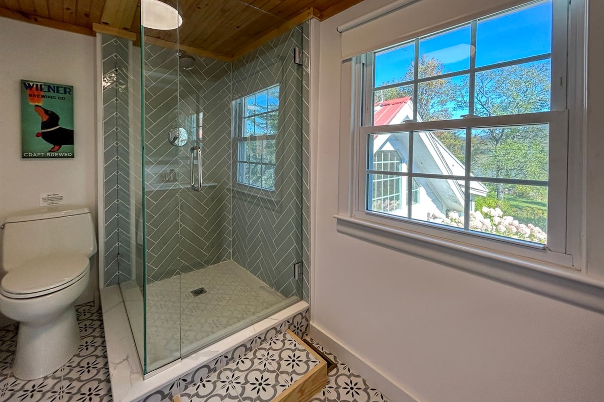 Bathroom 1 has been newly remodeled and is part of the primary bedroom suite on the second floor