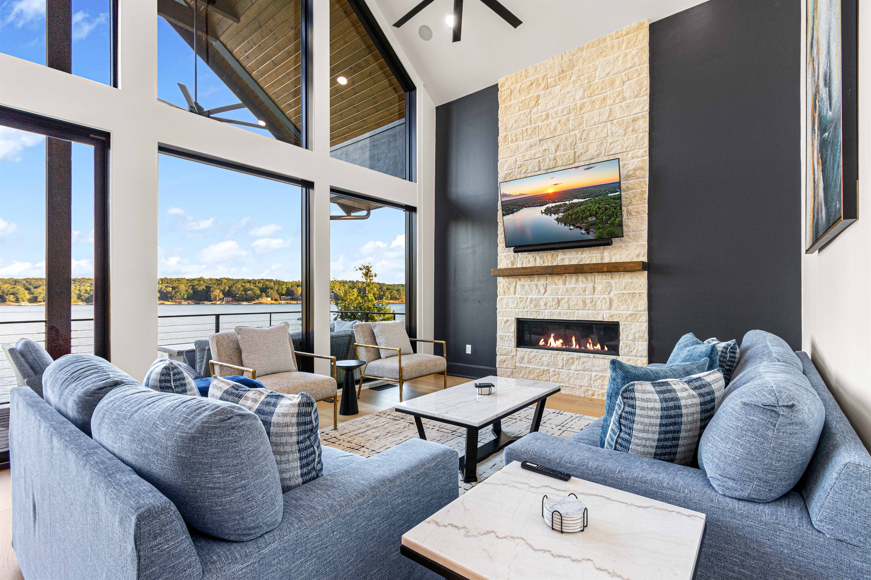 Curl up by the fire while the lake glows in the background.