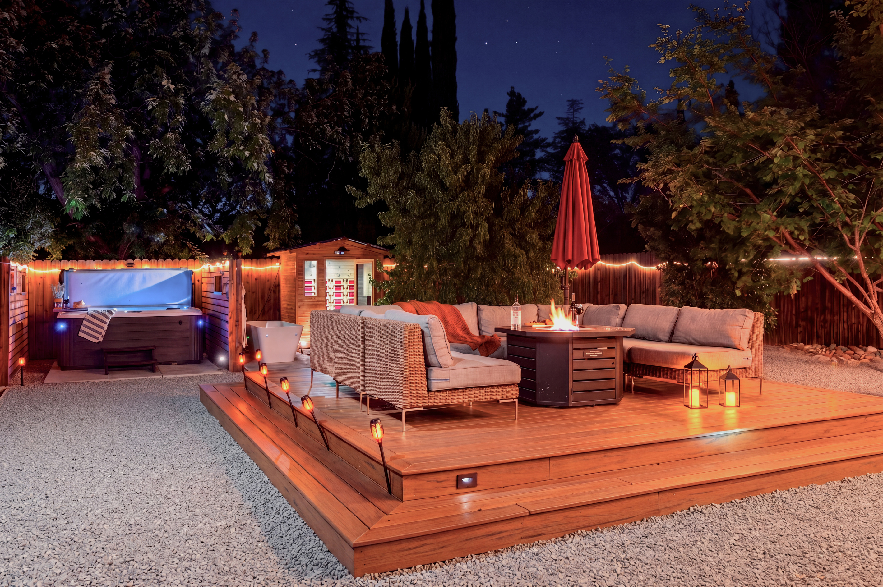 {Outdoor Oasis} Enjoy your private hot tub, infrared sauna and spacious fire pit lounge—all within one beautifully lit backyard retreat.