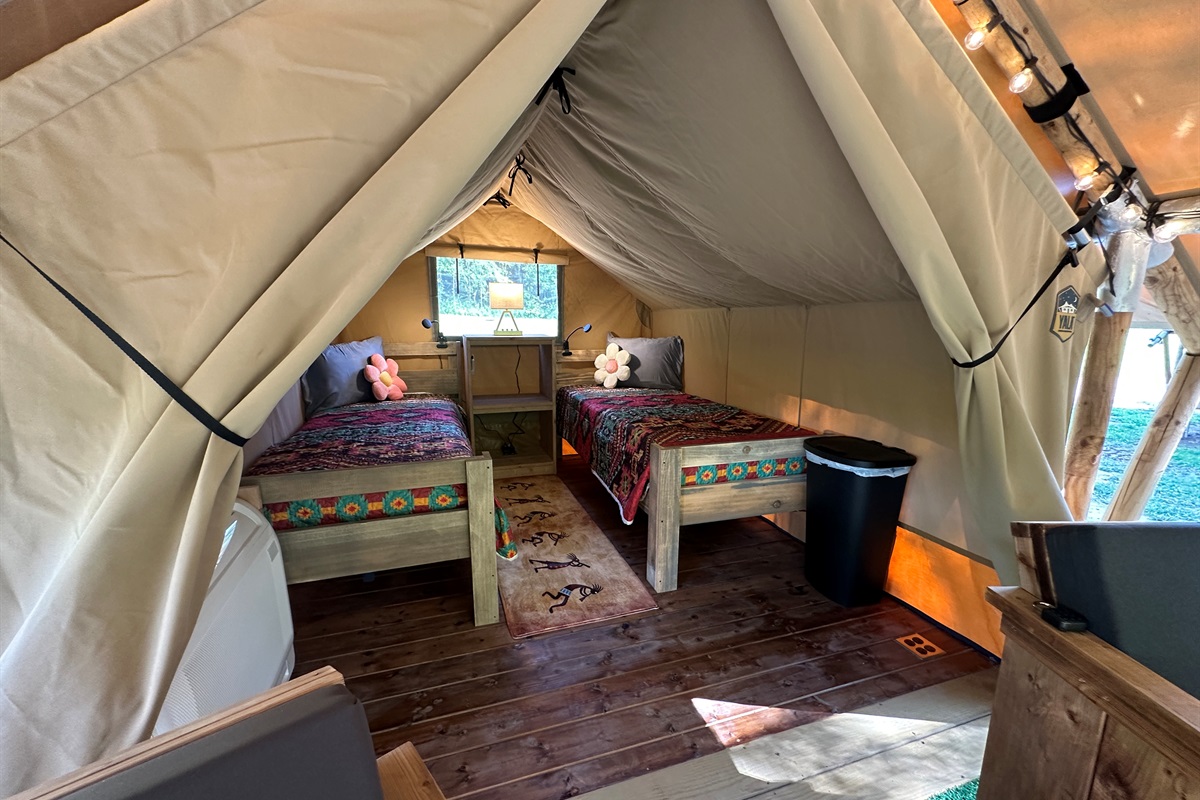 Leo sleeps 2 in single beds and has a mini split for all season comfort.