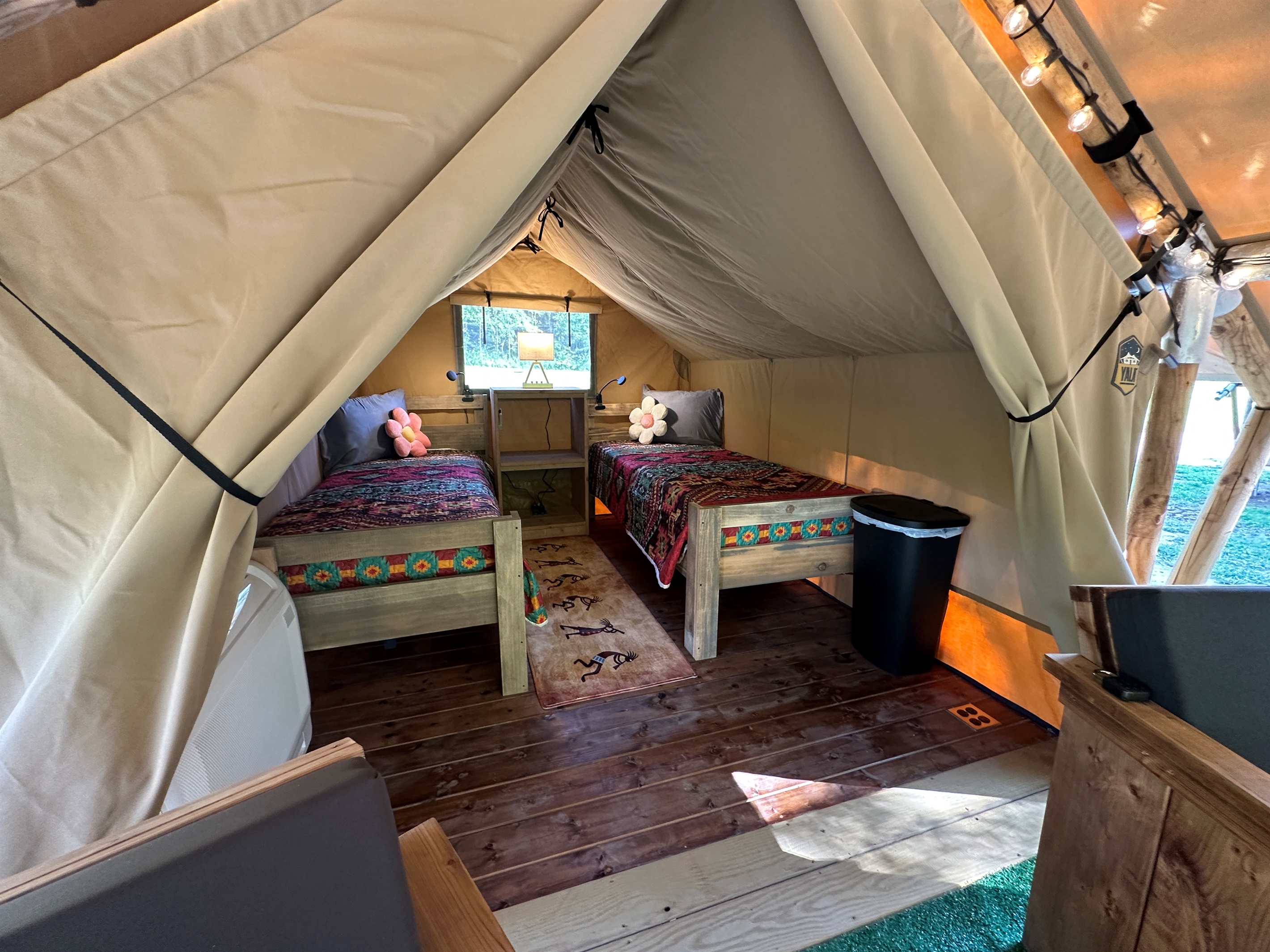 Leo sleeps 2 in single beds and has a mini split for all season comfort.