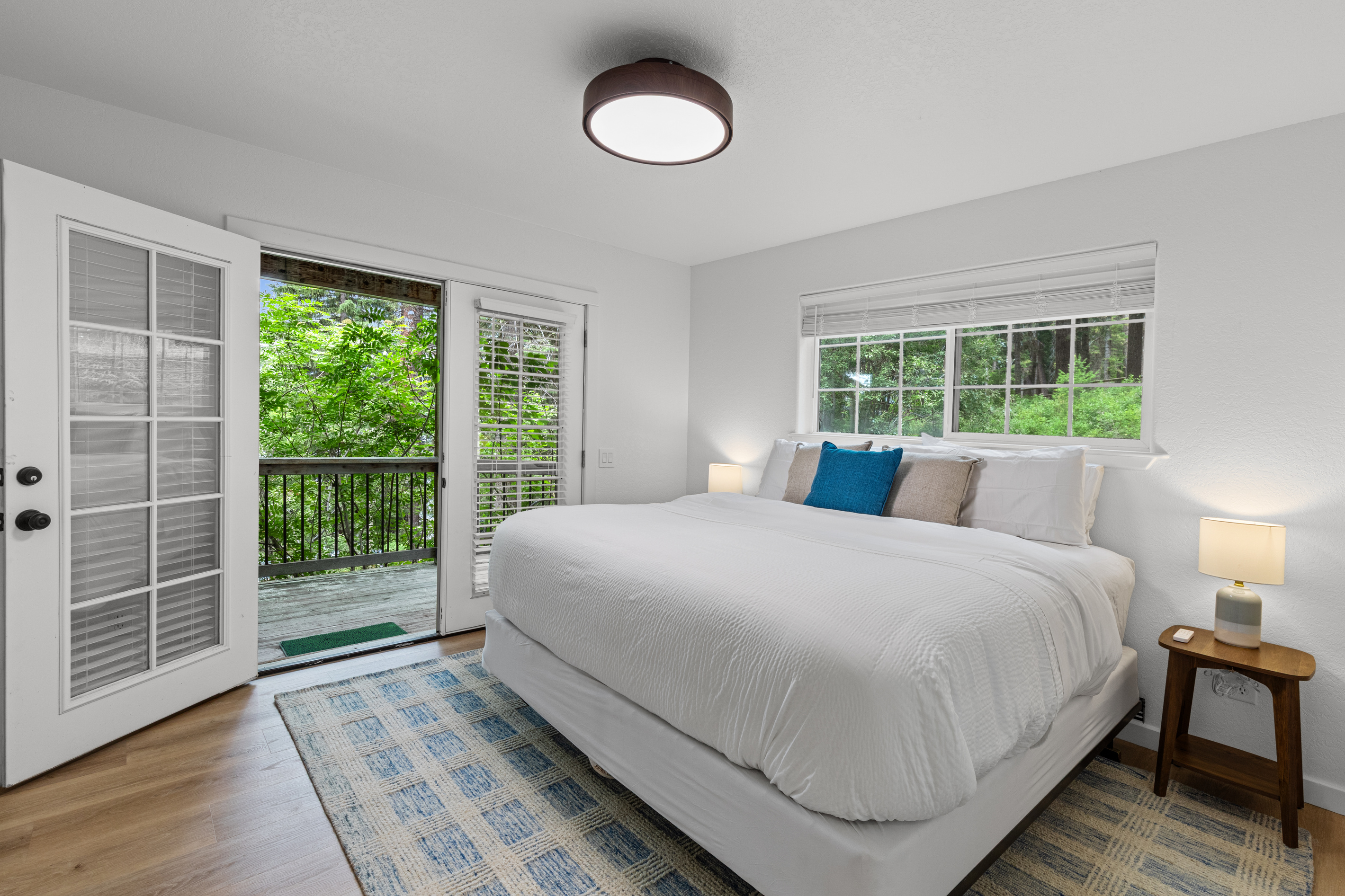 Hawks Nest Bedroom 2 with King size bed and balcony deck beautiful views quiet peacful