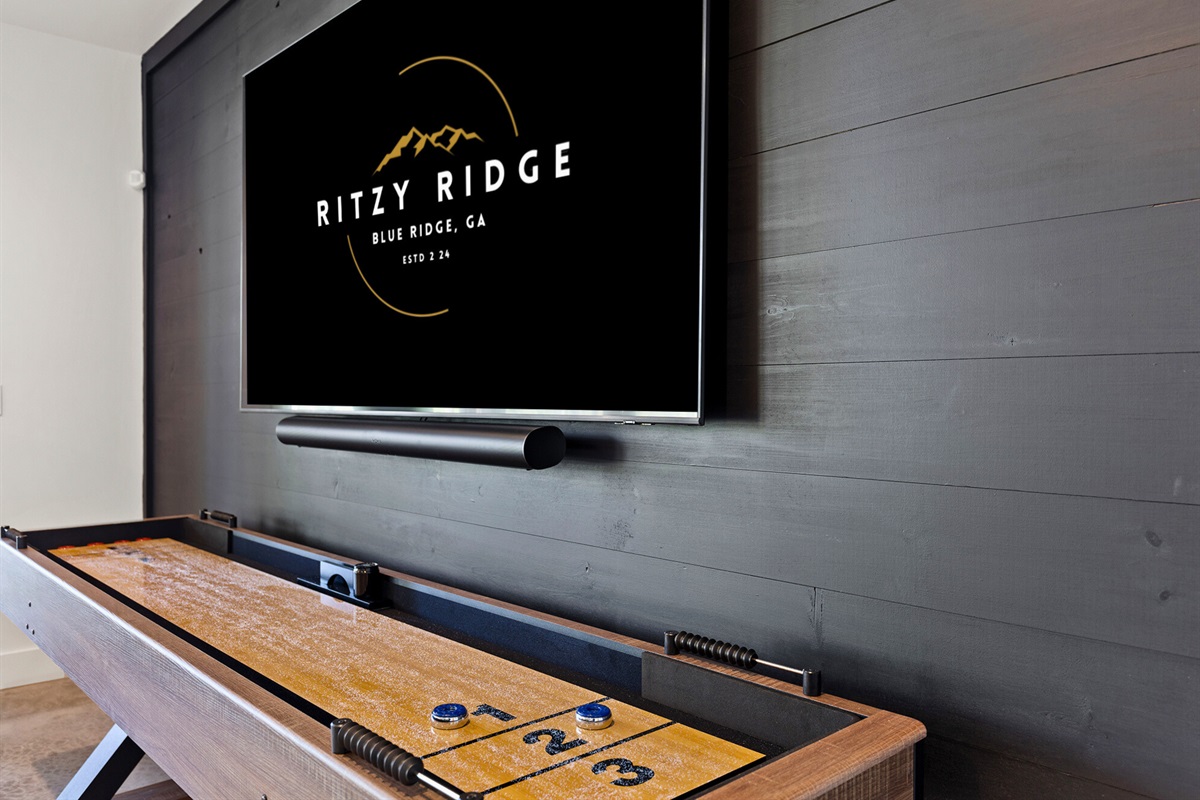 Slide into fun with this sleek shuffleboard table. Game on in style at Ritzy Ridge!
