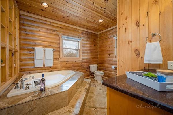 Primary bathroom. Attached to primary bedroom and walk in closet.