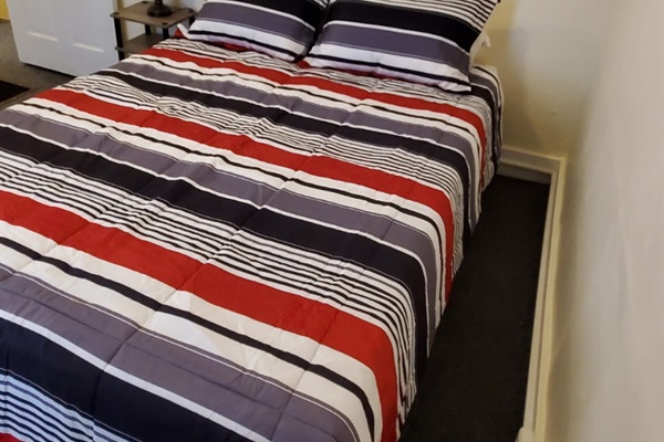 1 of 3 bedrooms all with Queen beds