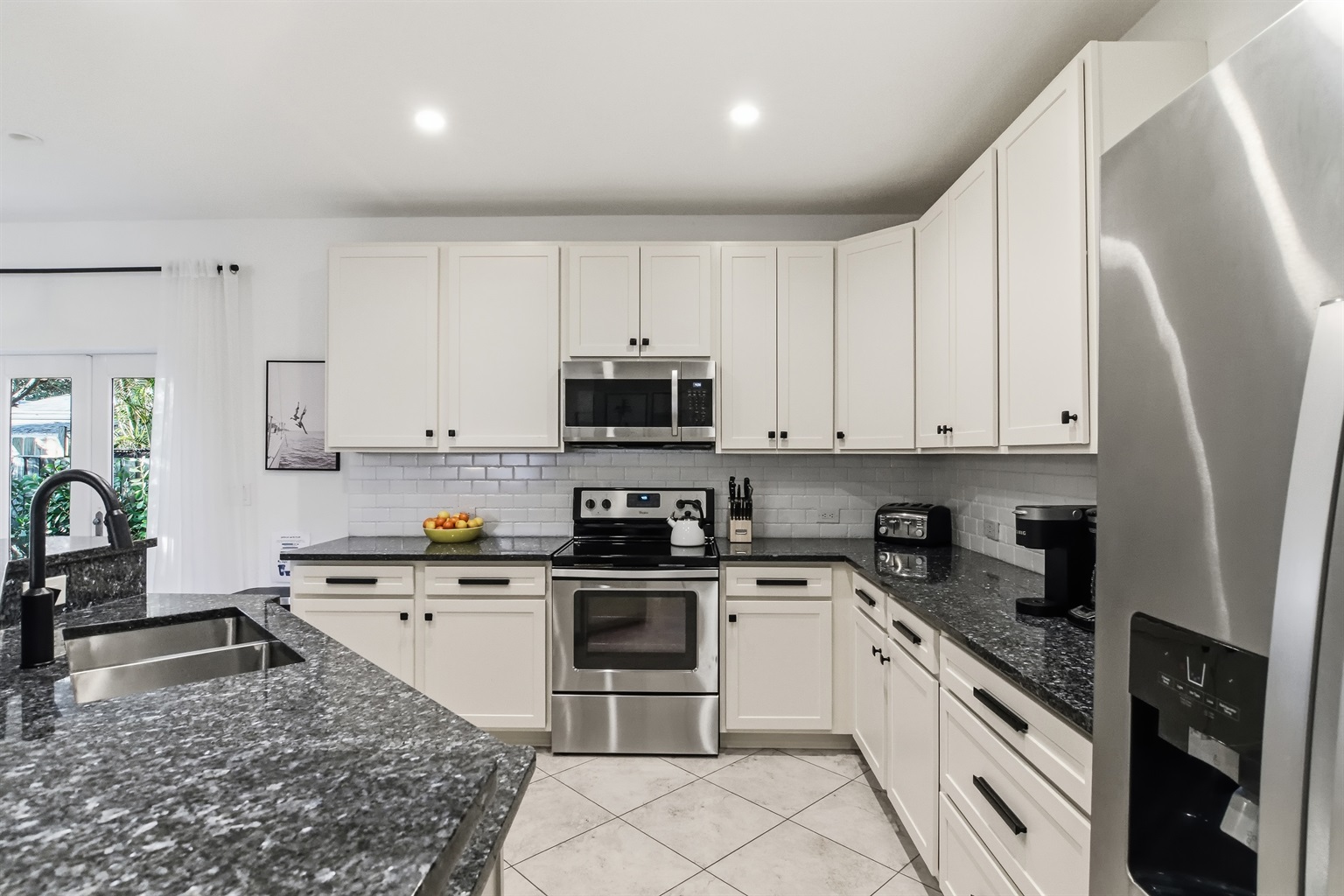 Well stocked, spacious chef's kitchen in the main house.