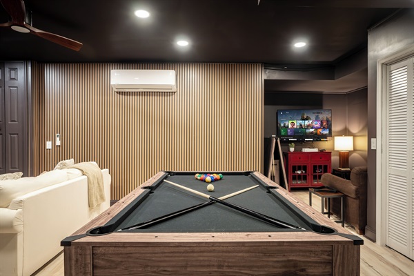 Game room with pool, foosball, video games, and more