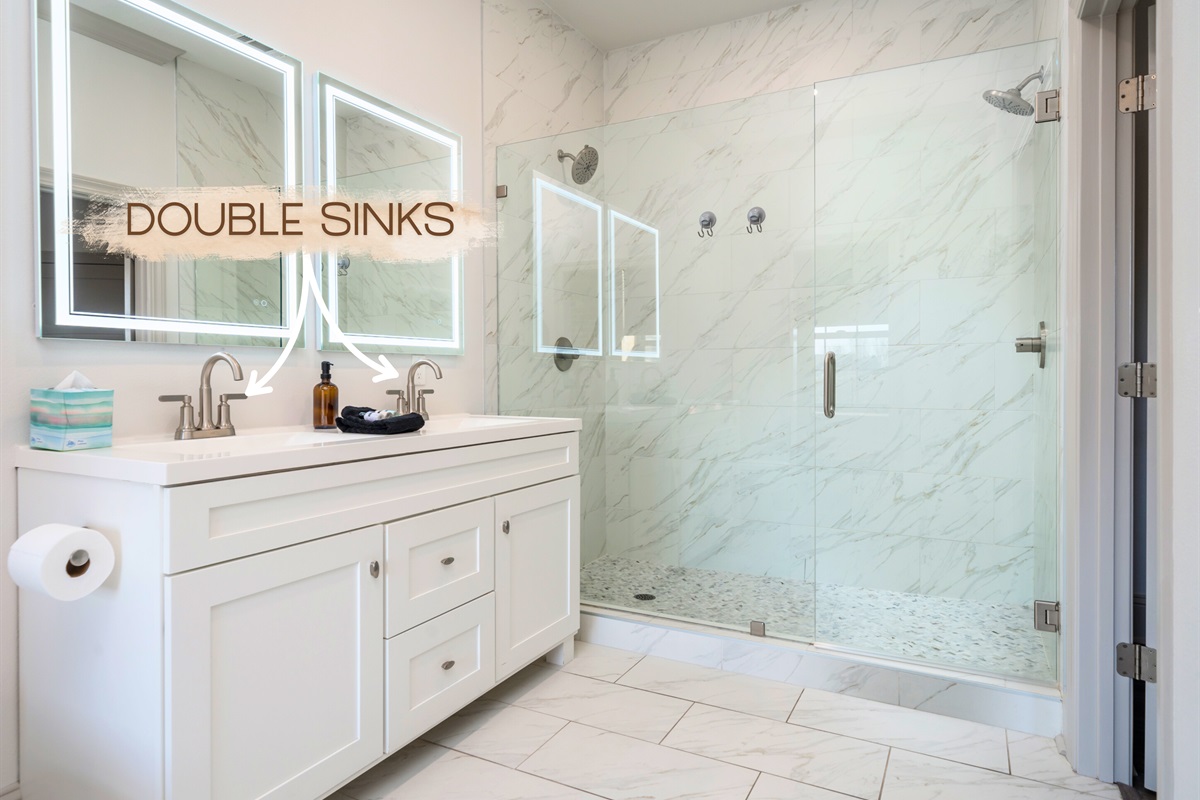 [Ensuite Bathroom] The Ensuite Bathroom Features a Double sink Vanity and His and Hers Double Shower!