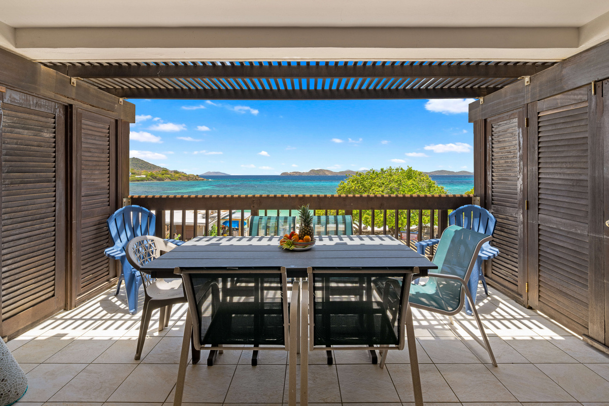 Unwind with panoramic Caribbean views from your spacious private balcony.