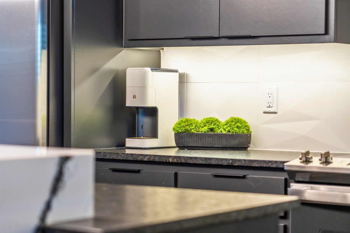 This elegant coffee station combines thoughtful design and sleek finishes, ensuring your mornings start with a touch of luxury.