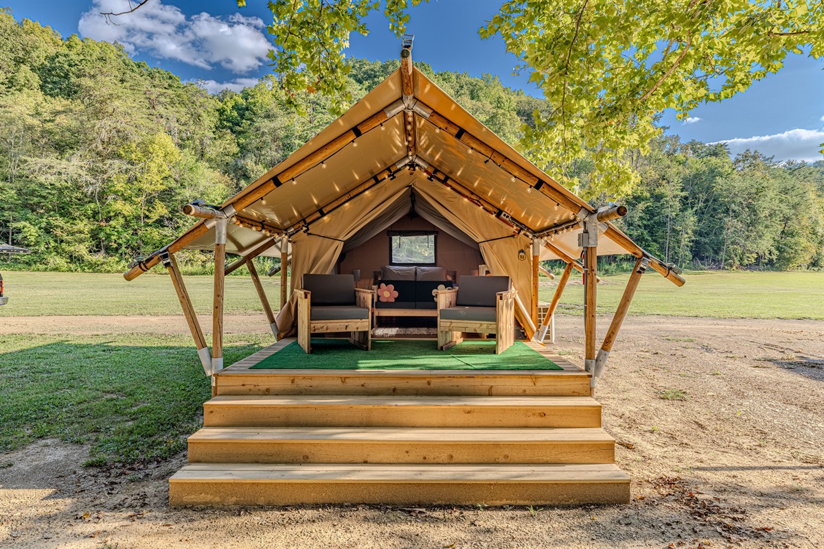 Welcome to Taurus! Your home away from home. Step up to your luxury tent, where a queen bed awaits behind a spacious deck perfect for morning coffee and enjoying the sounds of nature.