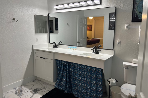 Bath with 2 points of entry - one from King Suite 2 and one from hall.
