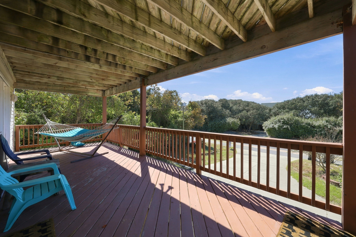 Claim the hammock early. This shady covered deck is made for afternoon naps.