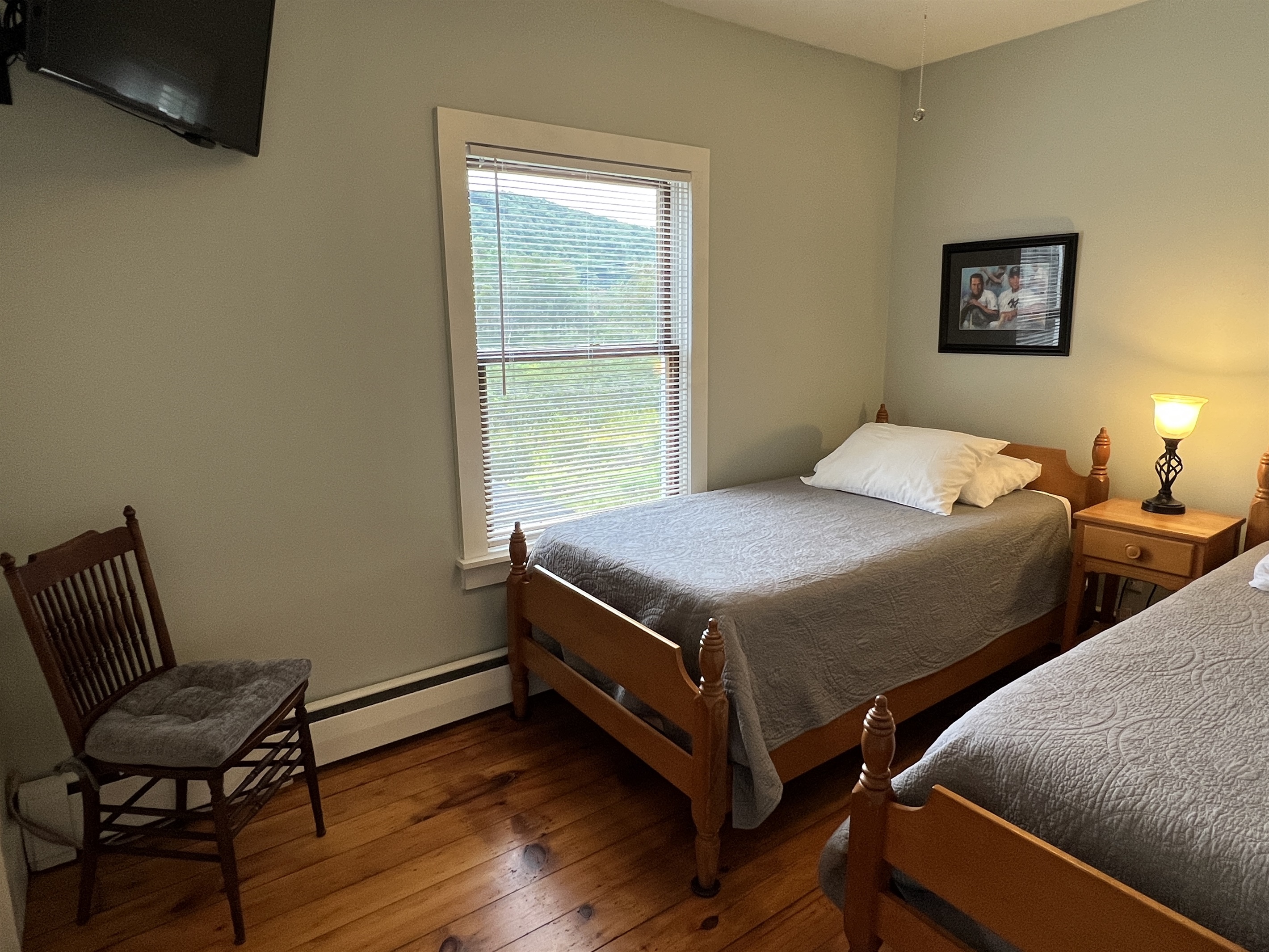 Cloverleaf Farm 2nd floor bedroom #4 with 2 twins and smart TV.