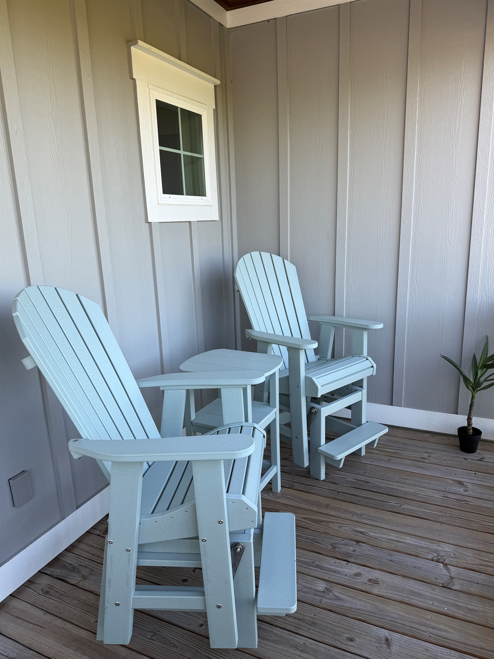 Enjoy your morning coffee in these tall glider Adirondack chairs on the balcony while you listen to the birds, frogs, and other wildlife in the wetlands below.  The perfect height to see over the railing without interference and enjoy the beautiful view!