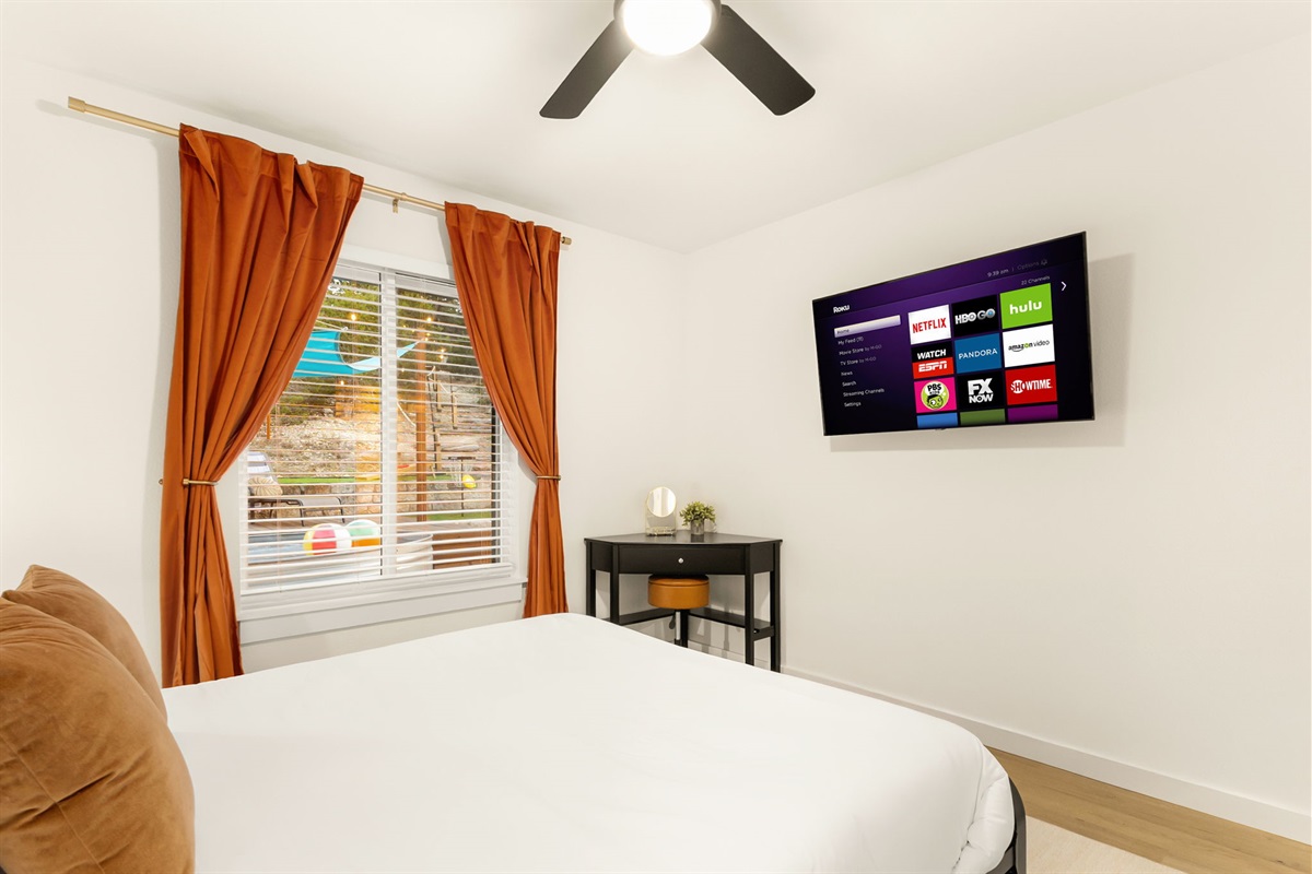 Simple and comfortable bedroom where you can crash after a full day of backyard adventures.