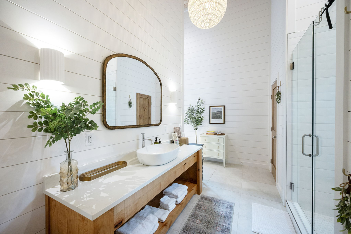 The private casita ensuite bathroom offers a luxurious, spa-like experience with premium finishes, warm design touches, and complete privacy—creating the perfect place to relax and recharge.