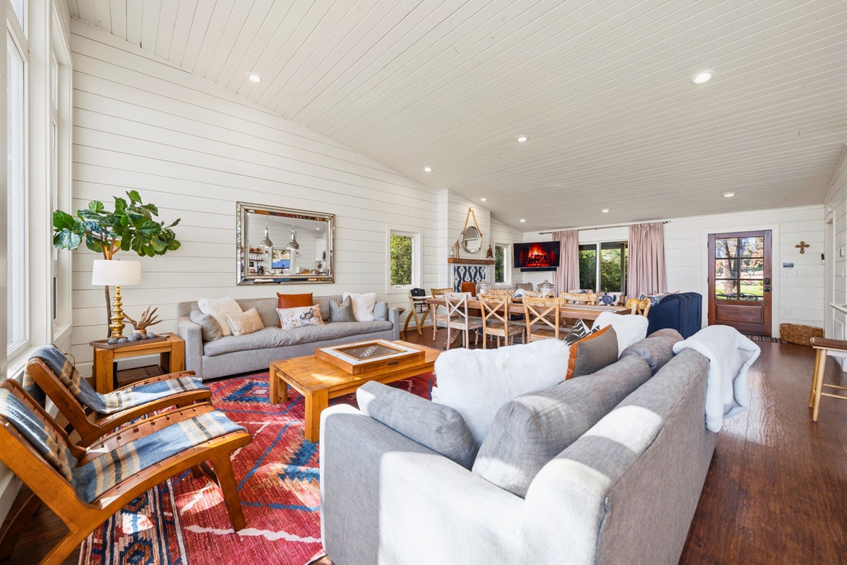 Enjoy another angle of the living space that highlights its open layout and comfortable seating for everyone in your group.