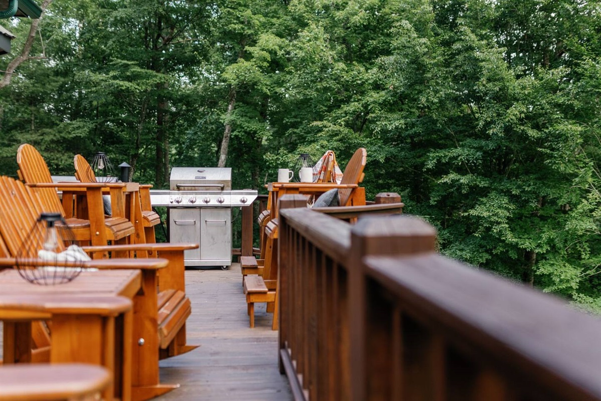 Use our gas grill and traeger smoker while you take in the forest and mountain views (Note: outdoor furniture has been updated to grey polywood)