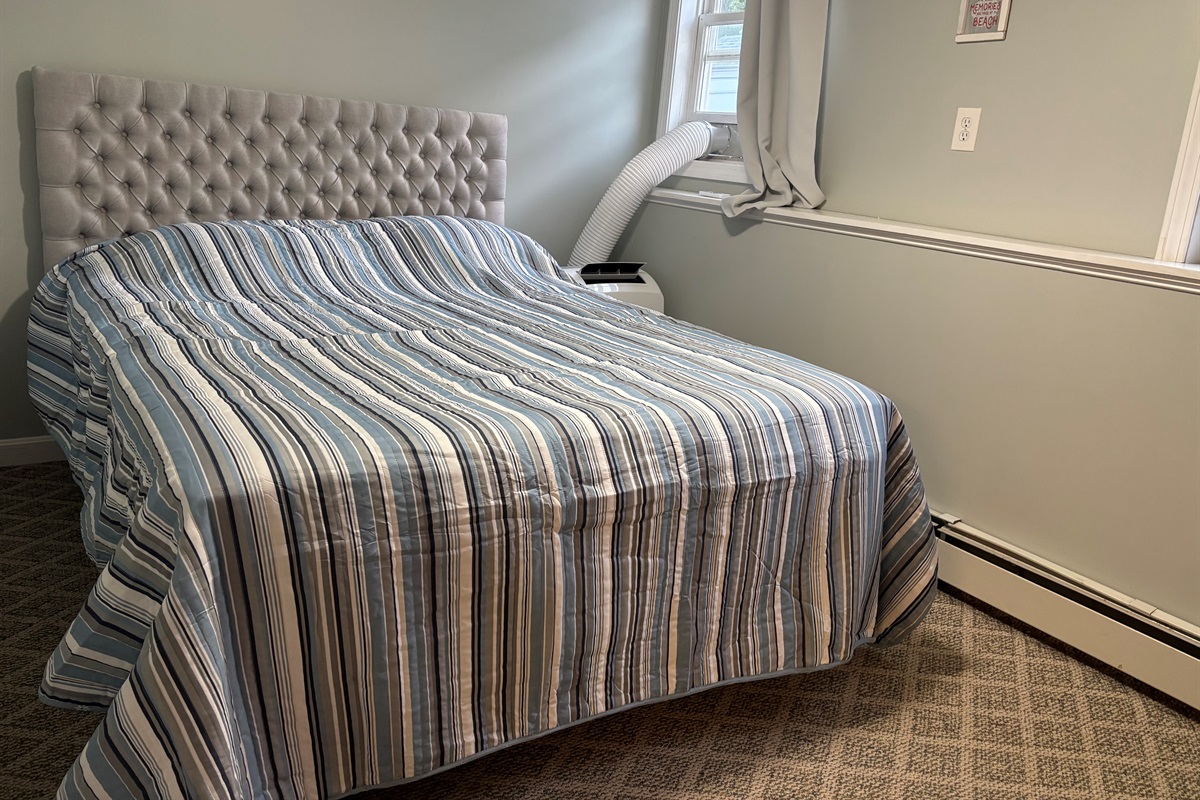 Queen bedroom in finished basement 