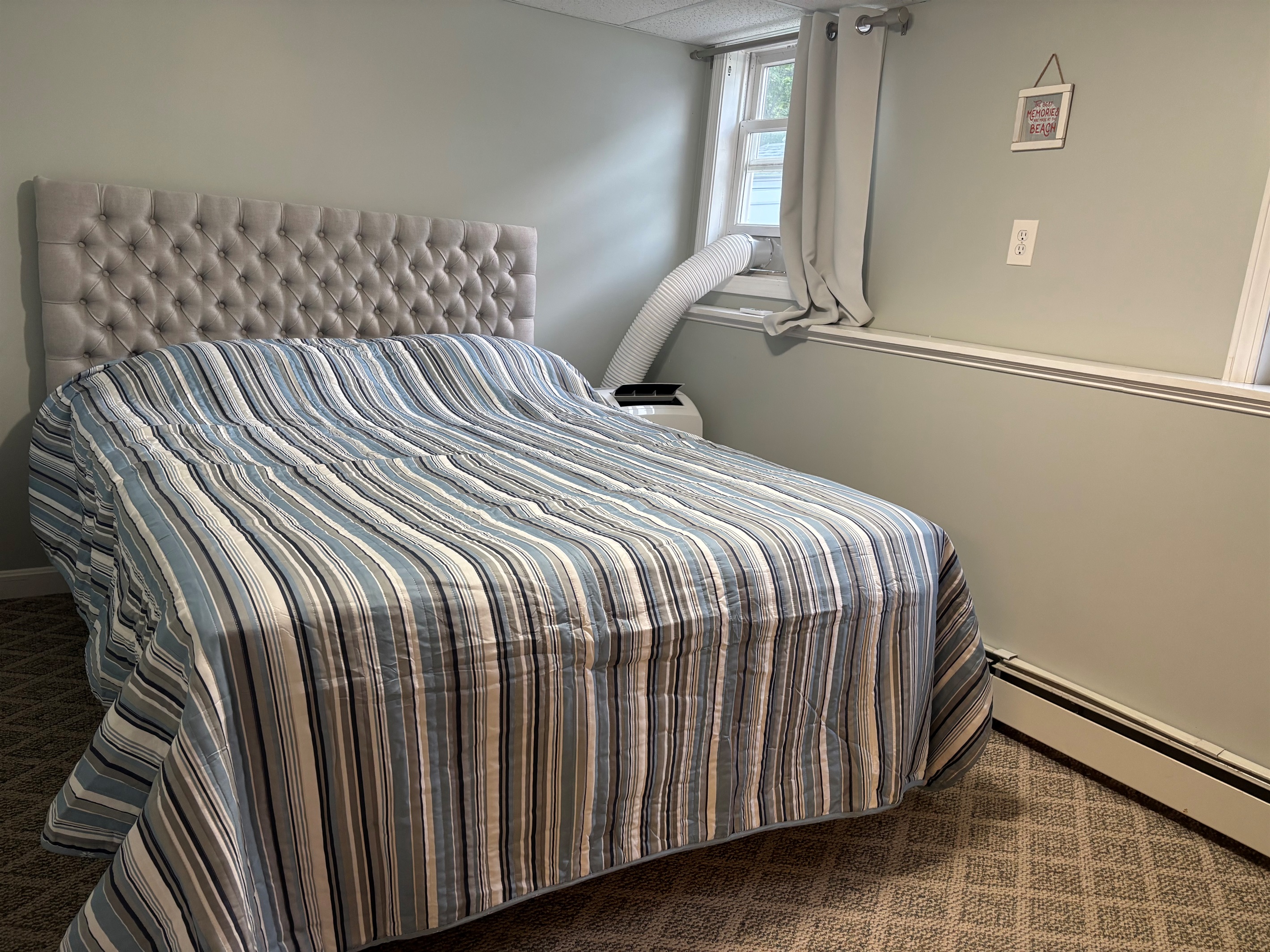 Queen bedroom in finished basement 