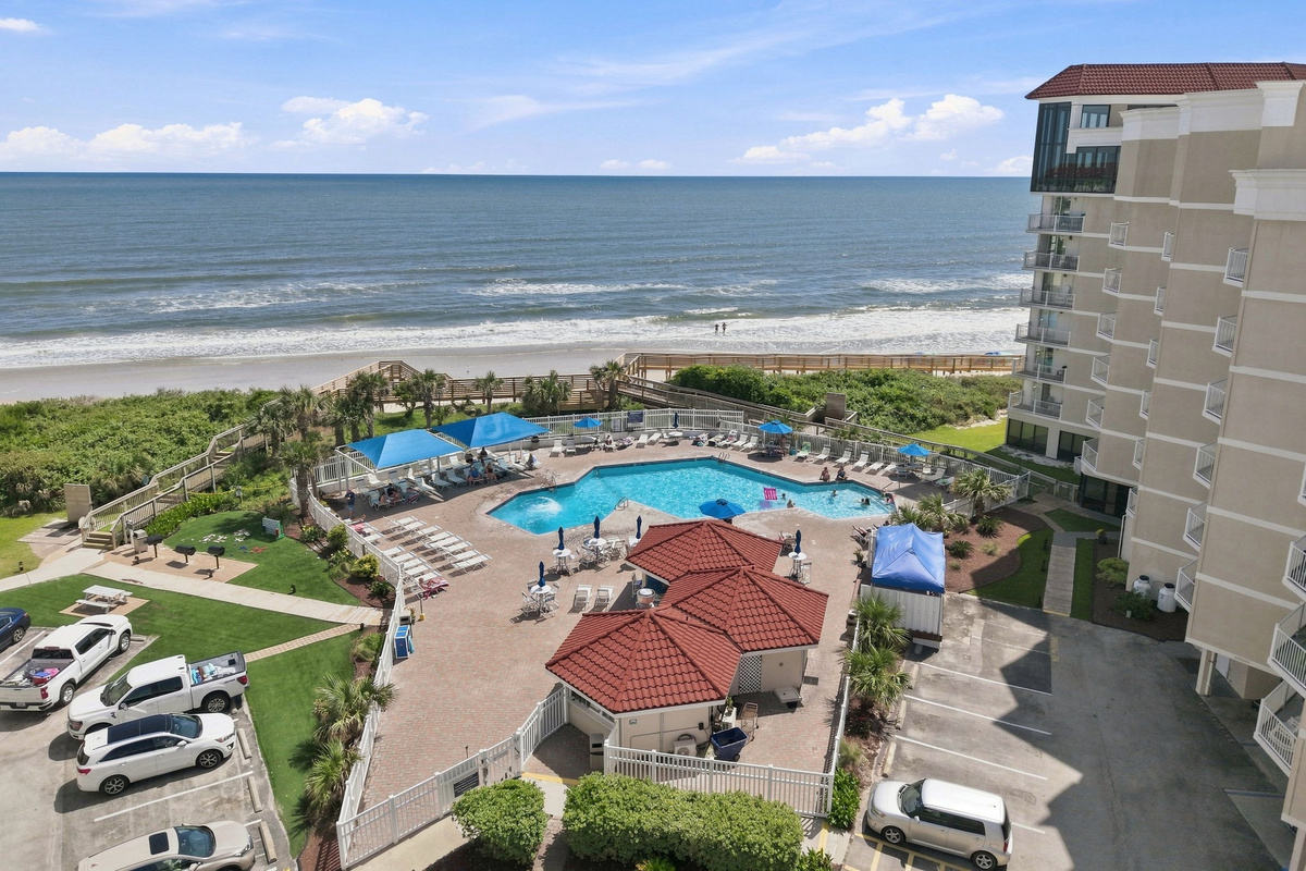 Soak up the sun by the outdoor pool, with direct beach access just steps away.
