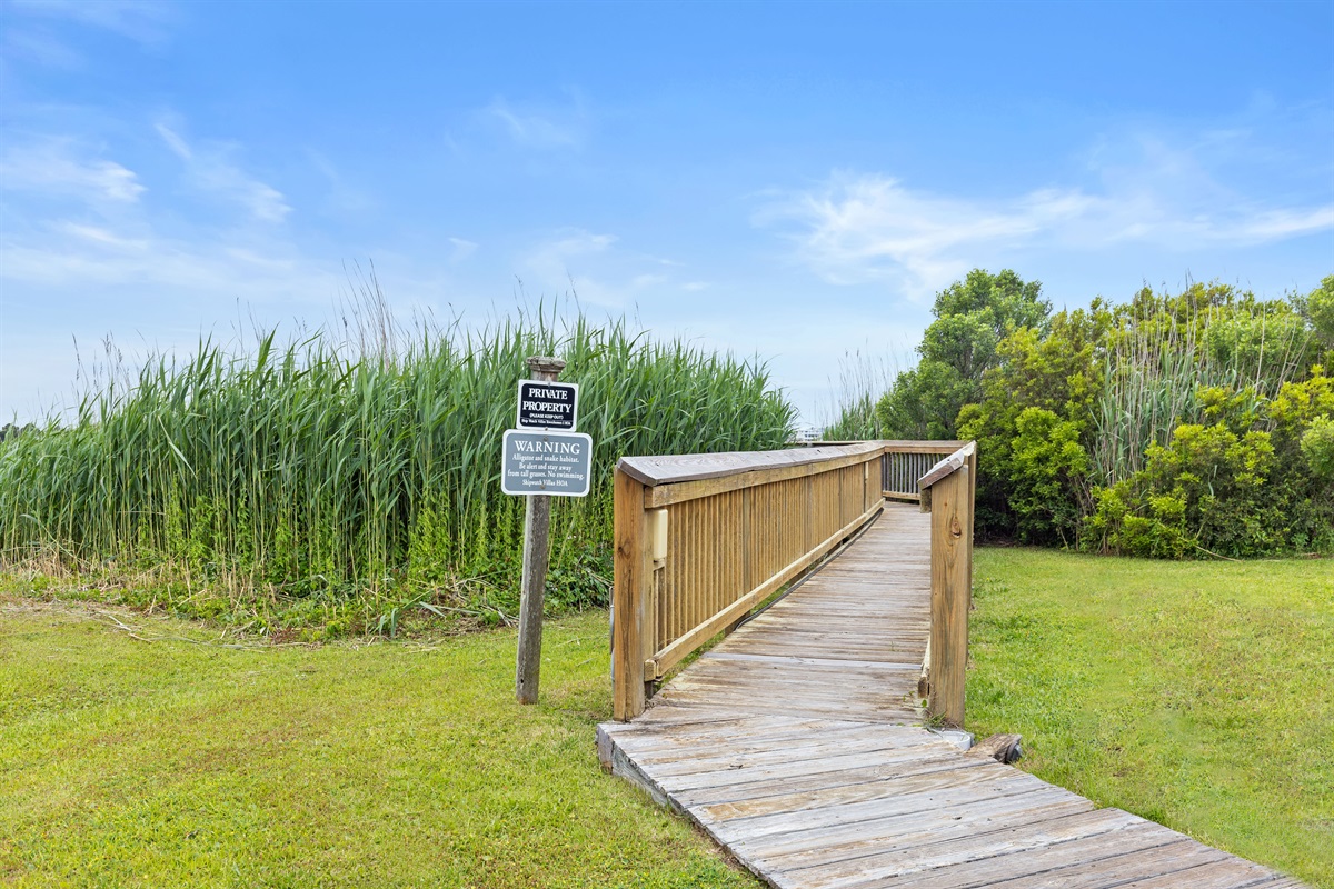 Easy access walkway through the dunes leading toward the shoreline
