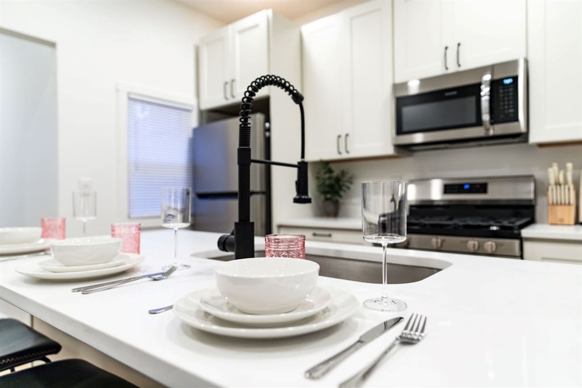 Counter kitchen dining setup with stylish tableware, perfect for enjoying your meals.