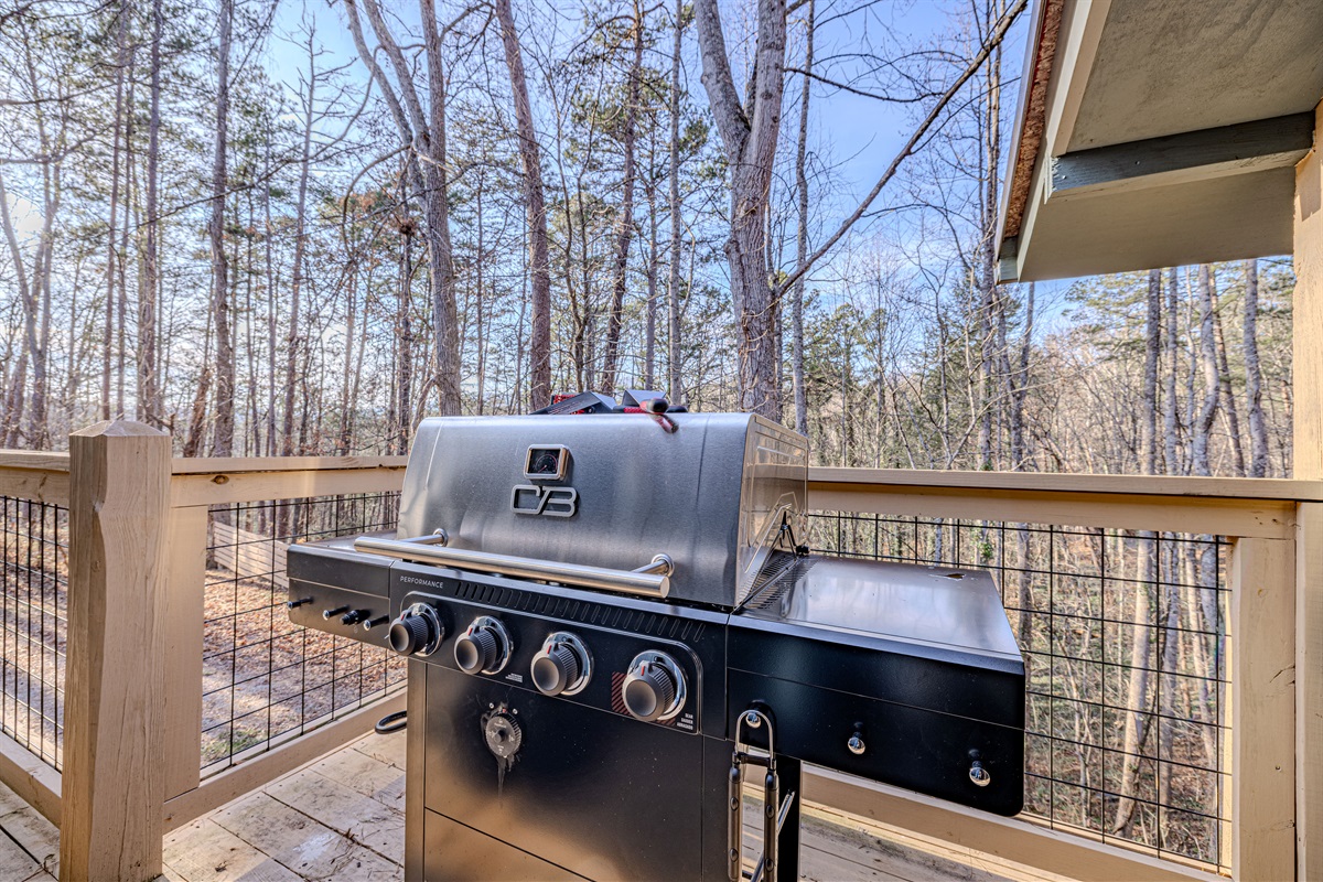 Fire up the grill! Enjoy true mountain barbecue with this modern Charbroil gas grill located right on the deck.