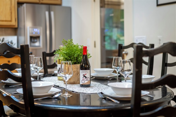 Fully stocked eat-in kitchen with table for 6
