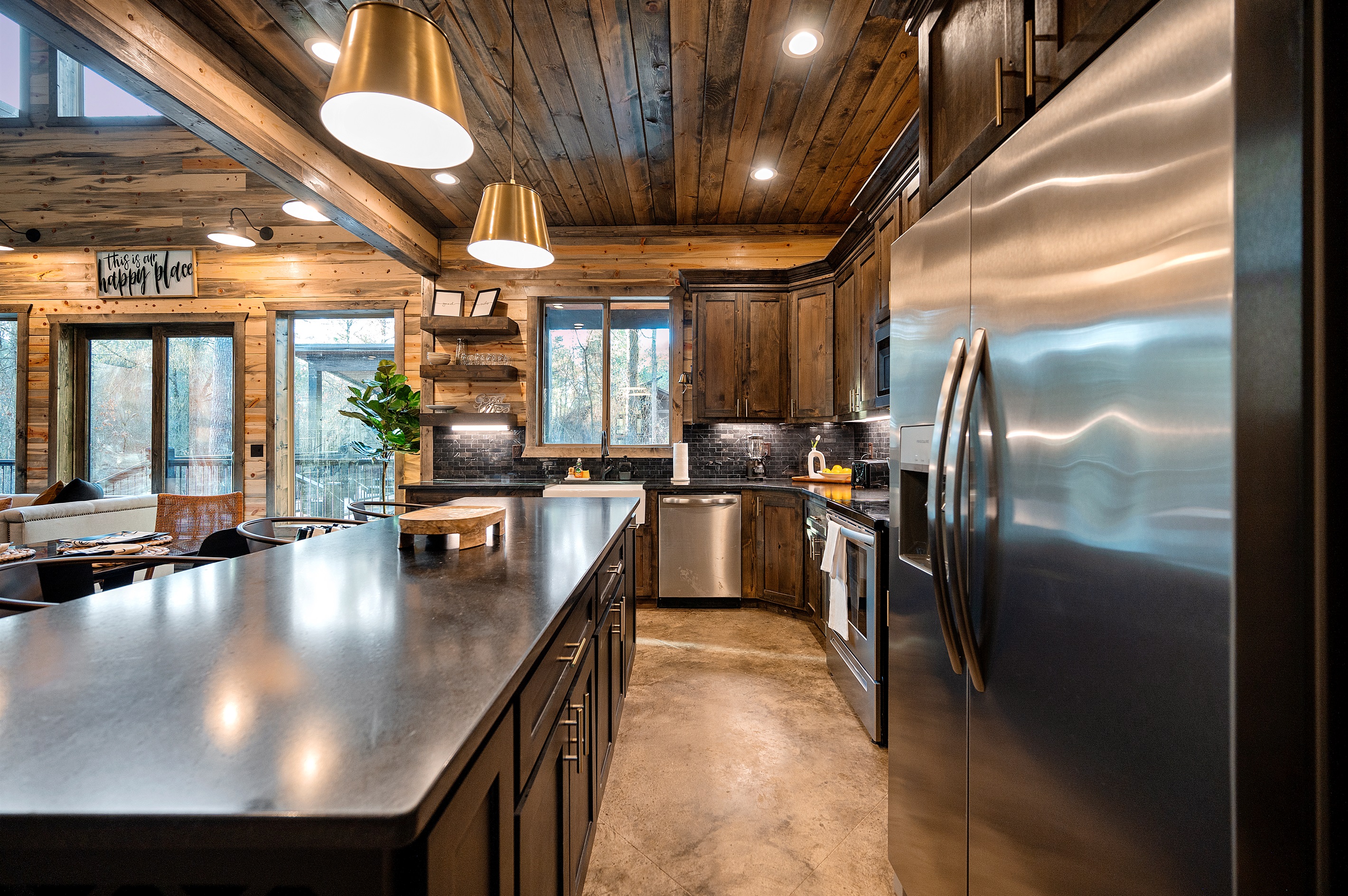 Brass lighting and rich wood tones set the mood for cabin living.