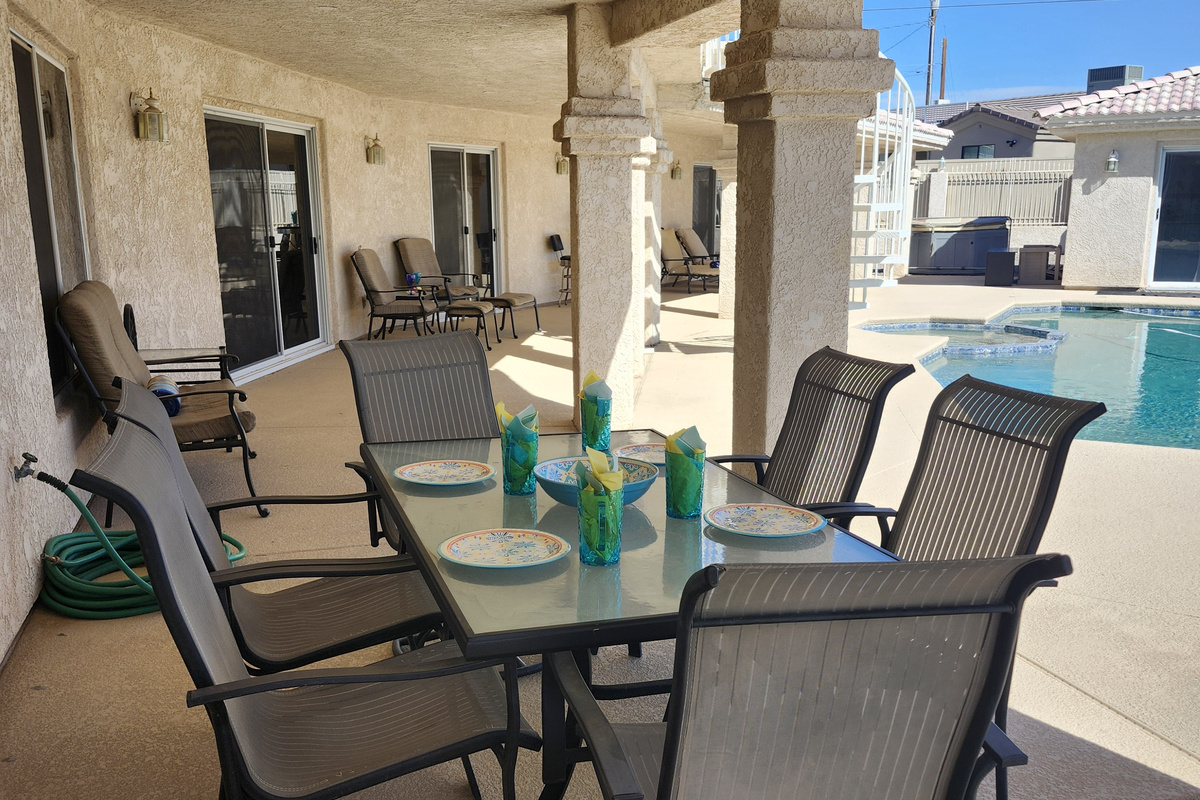 Full covered patio with multiple seating outside every room