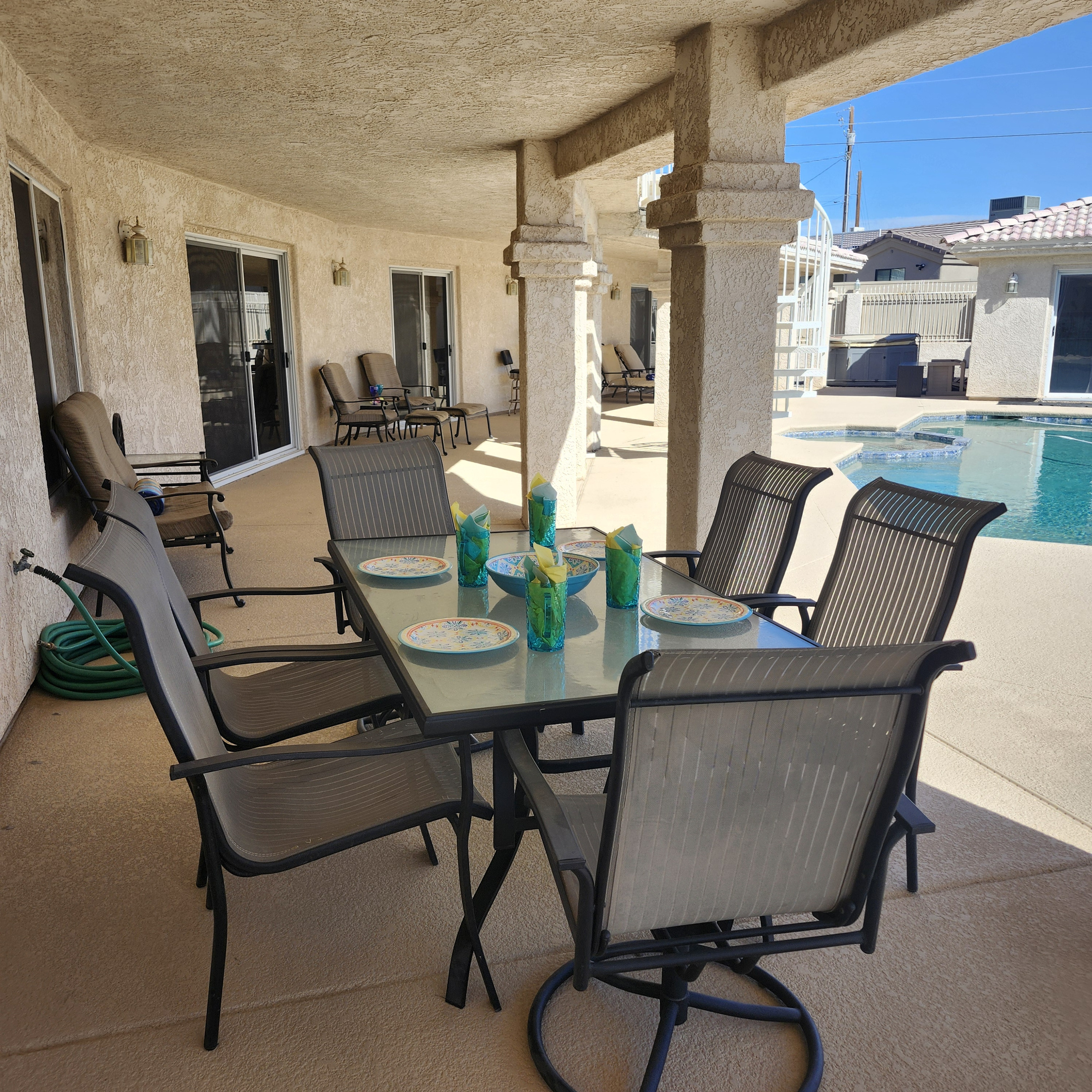 Full covered patio with multiple seating outside every room