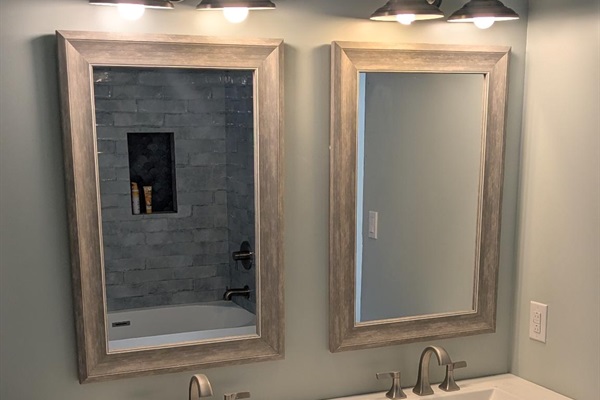 Mirrors are now installed in the bathrooms!
