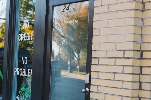 Exterior Front door is located after the Salon Surreal Business