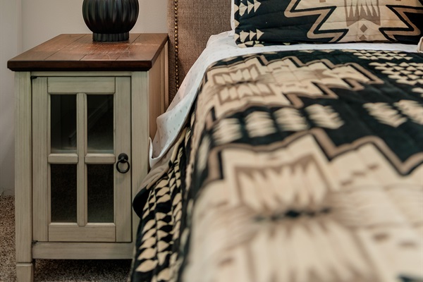 Master bedroom with king bed on main level.