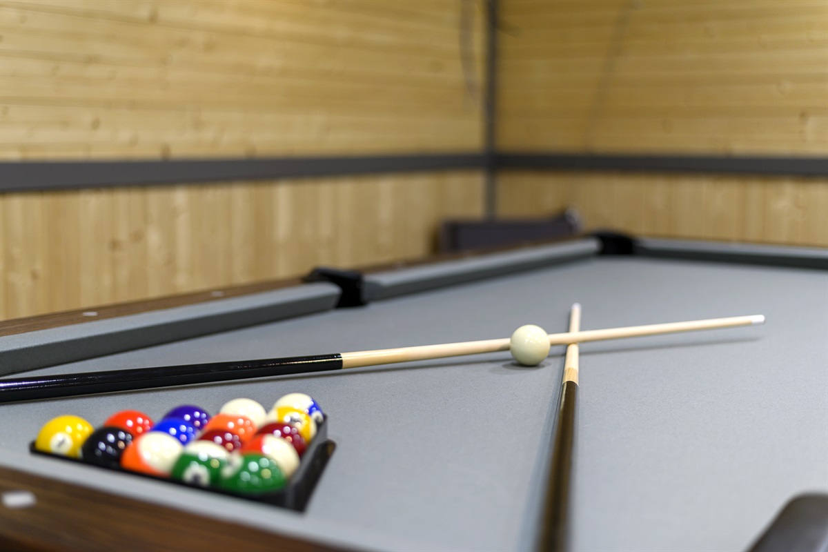 Venture down to the game room and enjoy Madison's 8ft pool table  This dedicated space guarantees that everyone can find something enjoyable to do while keeping the noise away from the upper level.