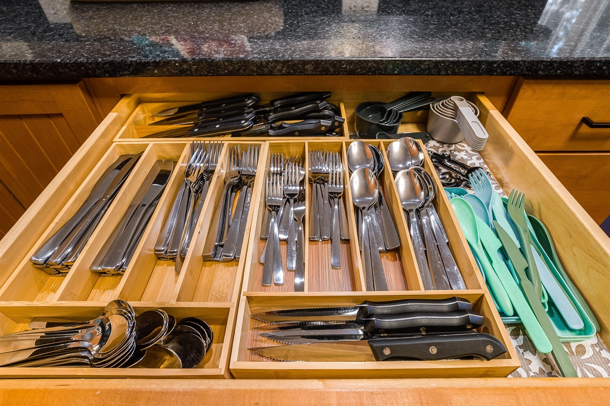 Fully stocked with utensils, knives, and extras — whether it’s pancakes in the morning or a big family dinner, the kitchen’s ready.