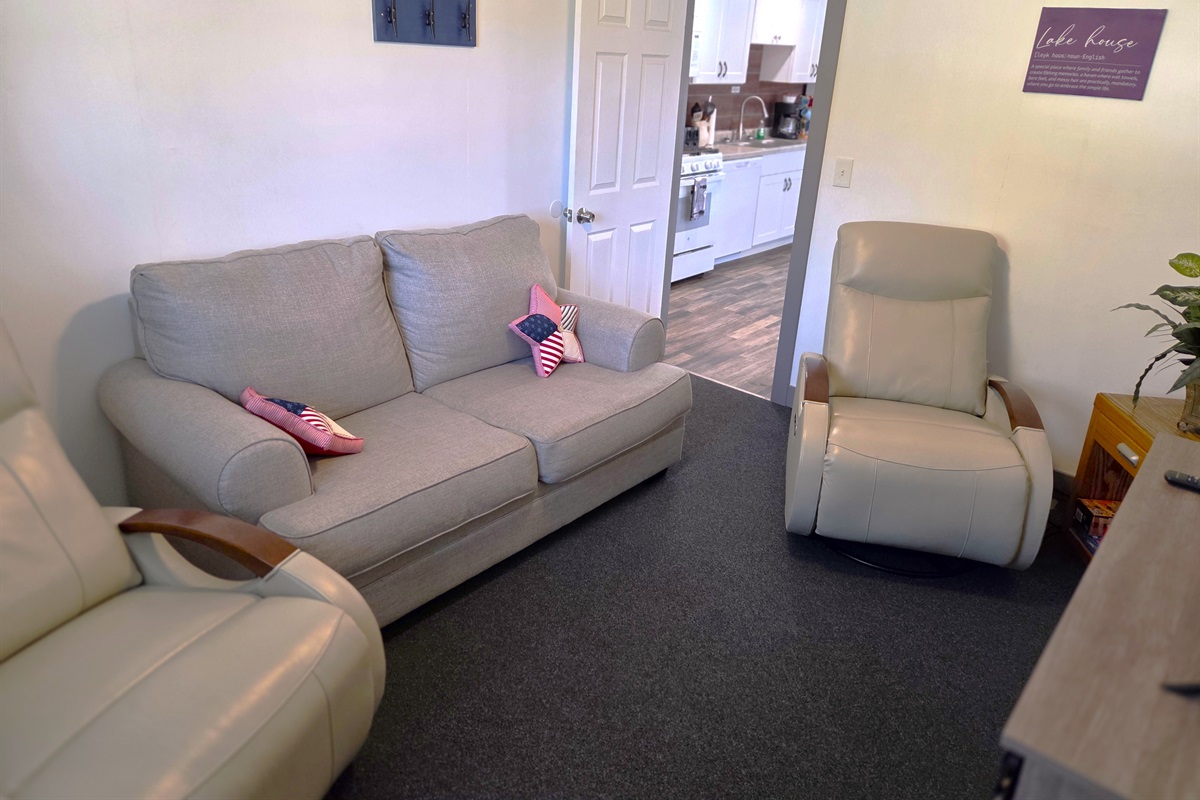 The living room is easily accessed from the kitchen / dining room.