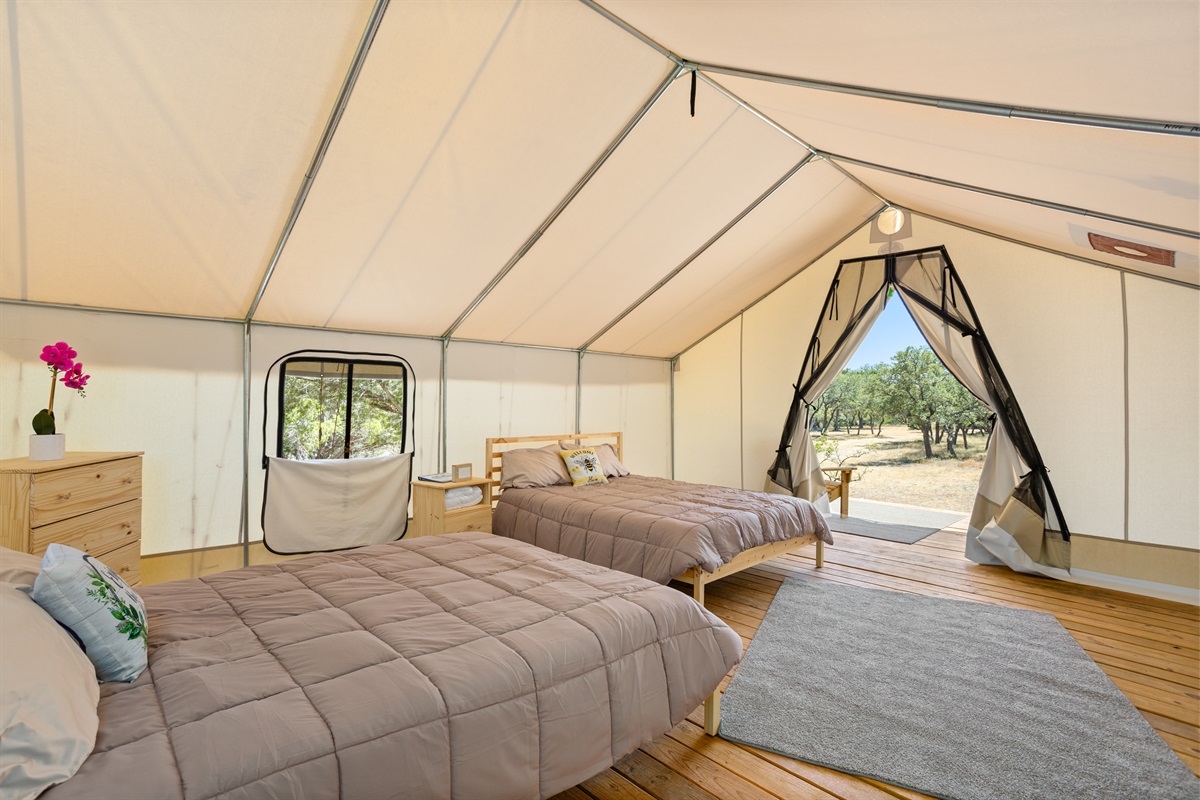 Two comfortable queen beds inside your tent